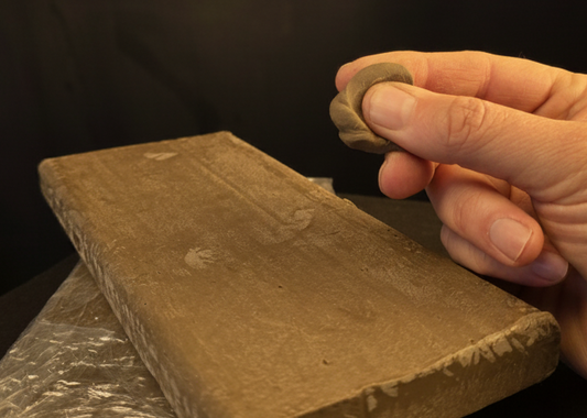 Wax-based clay