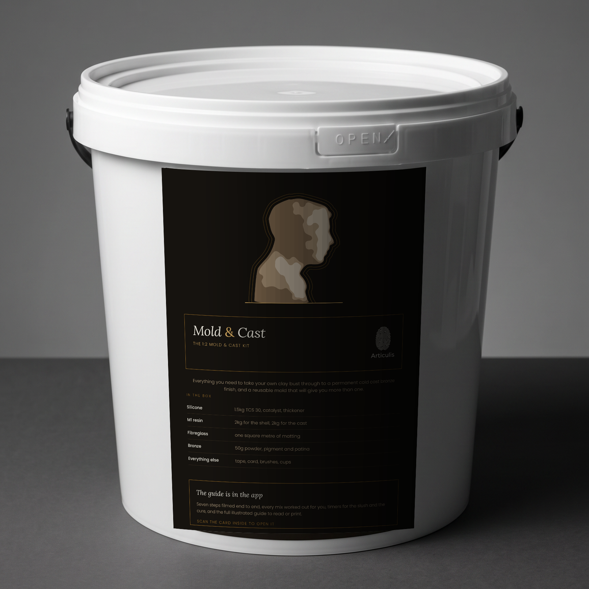 Articulis Mold and Cast Kit bucket with its label, on a grey studio background