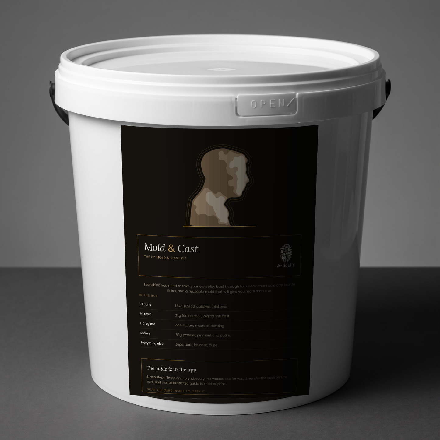 Articulis Mold and Cast Kit bucket with its label, on a grey studio background