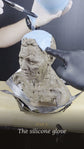 The silicone glove going on: silicone poured over a clay bust, from the Mould and Cast films